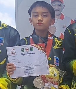 NAFIAN ARSAKHA: ATLET PANAHAN ASAL SMP IC LAHAT YANG SABET PERAK DI PORPROV XV MUBA